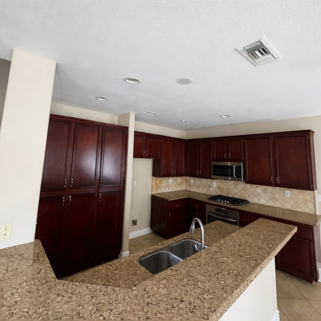 Dark cherry kitchen cabinets before refinishing