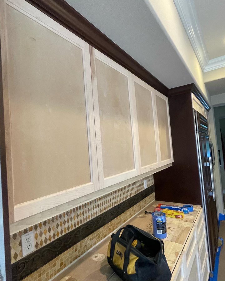 Kitchen cabinet doors masked and prepped before spraying, Orange County (3 of 6)