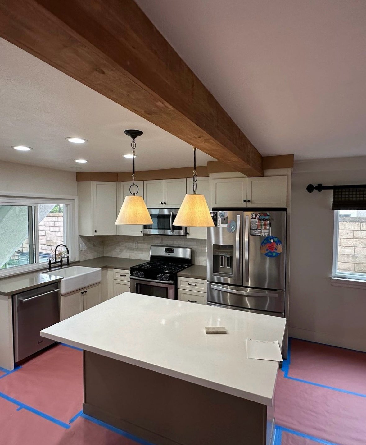 Kitchen cabinet doors masked and prepped before spraying, Orange County (4 of 6)